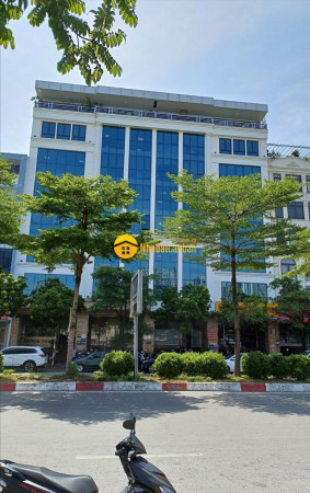 Bán tòa nhà văn phòng 9 tầng mặt phố trần vỹ dt 140m2. giá 62 tỷ